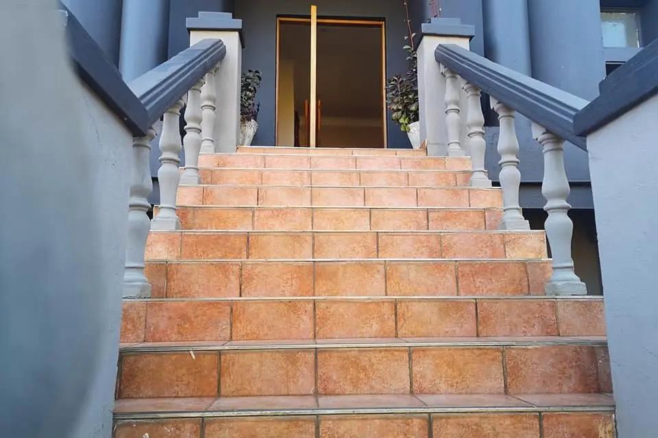 The tiled staircase at the entrance to the guest house