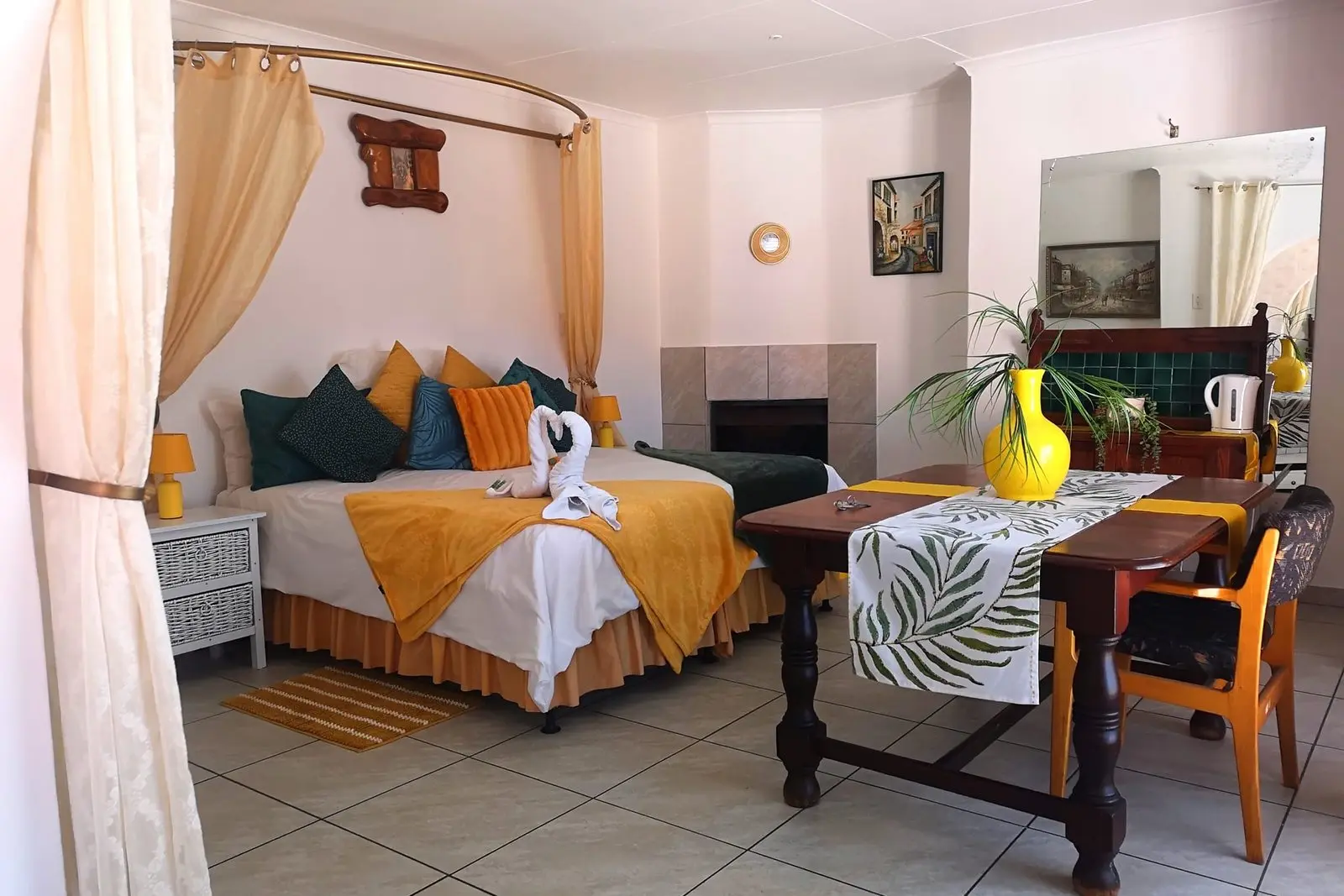 The Honeymoon Suite with its sheer canopy bed and warm lighting